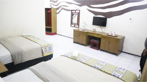 Oro Oro Ombo Hotel | PLUM Hotel Palereman Batu