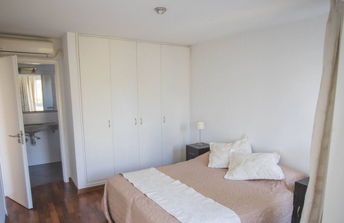Pocitos Apartment | Pocitos Beach with full services (supermarket, restaurants) nearby.