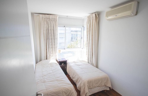 Pocitos Apartment | Pocitos Beach with full services (supermarket, restaurants) nearby.
