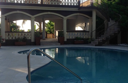 Runaway Bay Apartment | Pool View Two Bedroom Apartment with En-Suite, Open Kitchen and Living Room
