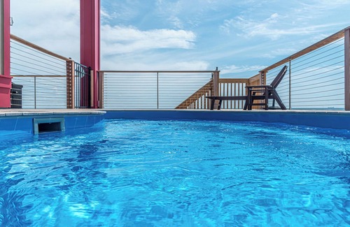 Fort Morgan House | Postcard views from your home equipped with a dream kitchen! Come enjoy luxurious living in a highly sought-after neighborhood in Fort Morgan.