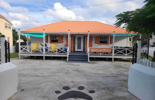 Cockburn Town Villa | Potcake Villa — Stay with Purpose: Support Animal Welfare