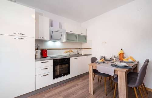 Policnik Apartment | Practical holiday apartment with large communal garden.