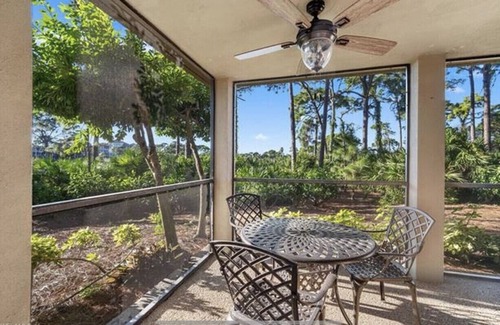 Bonita Bay Apartment | Pristine Corner Unit - Golf Course Views from Quiet Wrap Around Lanai