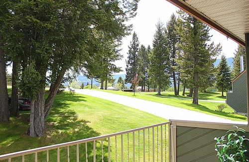 East Kootenay House | Private beach and lake access at Windermere Lake. NEW POOL AND HOT TUB NOW OPEN!