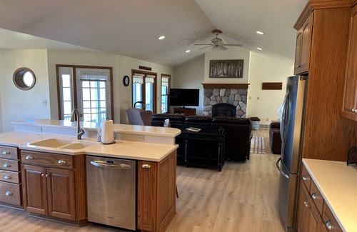 Ludington House | Private Hamlin Lake Water Front Cottage Perfect Family Retreat