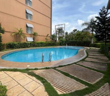 Puerto Princesa City Centre Apartment | Puerto Princesa Palawan Queen Bed Studio with Pool, Gym, Security, View