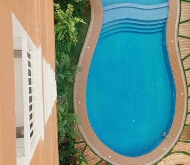 Puerto Princesa City Centre Apartment | Puerto Princesa Palawan Queen Bed Studio with Pool, Gym, Security, View