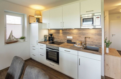Neßmersiel Apartment | "Pure relaxation: Modern Waterkant vacation apartment with far-reaching views and comfort!"