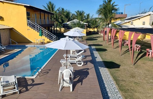 Barra Nova Villa | Quadruple suite, air conditioning, double bed, single beds, smart TV and minibar