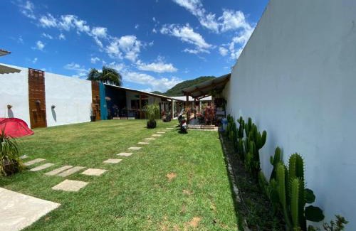 Tombo House | QUARTOS Praia do Tombo Guarujá