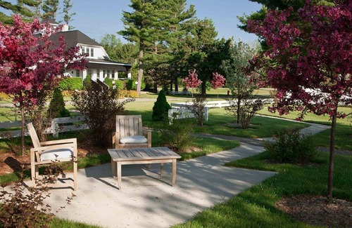 Suttons Bay Cottage | Quiet, Private, Waterfront - Luxury on 125 Ft. of Suttons Bay