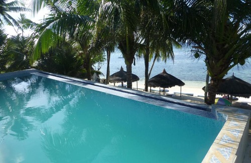 Anda Resort | RedDoorz Premium @ Flower Beach Anda