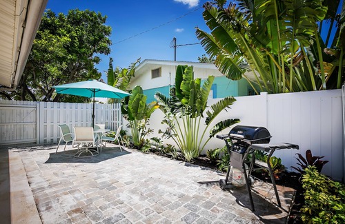Ilexhurst Cottage | Relax and Tan on Your Private Patio. Just a minute to the beach