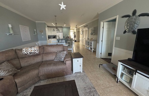 Sunset Island Condo | Relax in this 3BR 2BA second floor condo in gated community with pool and beach