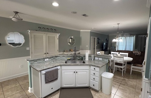 Sunset Island Condo | Relax in this 3BR 2BA second floor condo in gated community with pool and beach