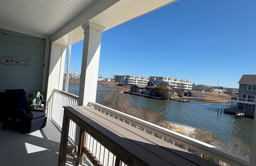 Sunset Island Condo | Relax in this 3BR 2BA second floor condo in gated community with pool and beach