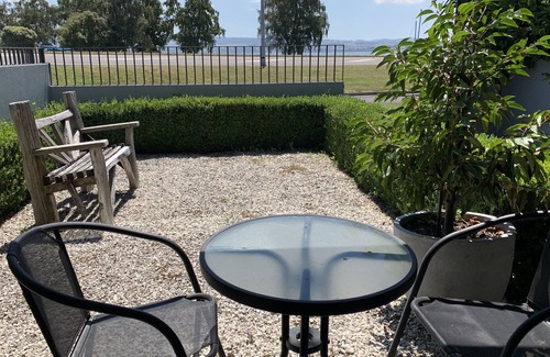 Two Mile Bay Apartment | Relax, unwind and enjoy the views from this unbeatable lakeside location.