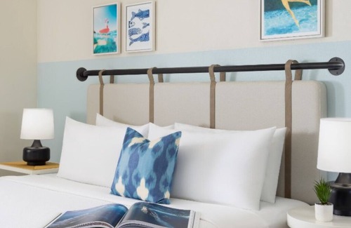 New Town Hotel | Relax & Play in Key West | Shuttle, Lawn Games & Poolside Dining