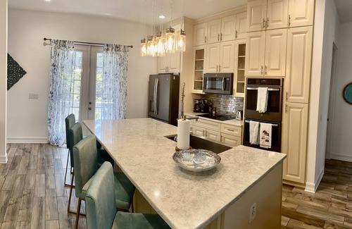 Palm Harbor House | Relaxing Beach Style Home with Heated Saltwater Pool in Crystal Beach