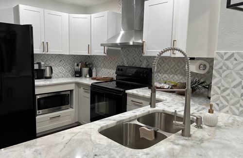 Largo House | Relaxing family friendly heated pool home close to beach