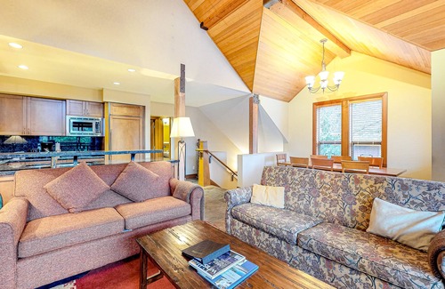 Village North House | Relaxing first-floor townhouse with a private hot tub, fireplace, & great views