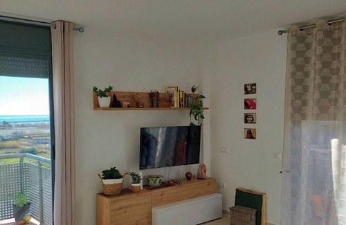 Sant Carles de la Rapita Apartment | Relaxing stay with panoramic Delta and harbour views.