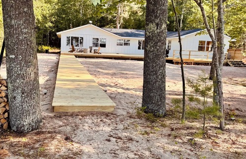 Rumely House | Renovated and Spacious Beach House across the Street From Ski/Snowmobile Trails