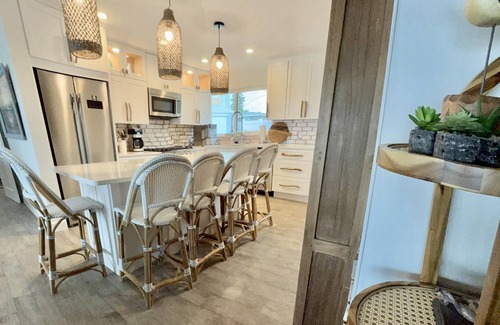 New Smyrna Beach House | Renovated, direct oceanfront 5BR/6BA private pool home sleeps 16.