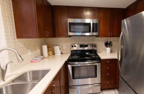 Village North Condo | Renovated Ground Floor Condo. Spacious Floor Plan, Pool & Hot Tub Onsite