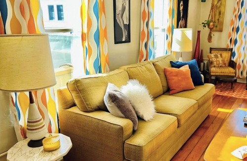 Moline Apartment | Retro & Modern Downtown w/Deck, Fire Pit, Pac Man