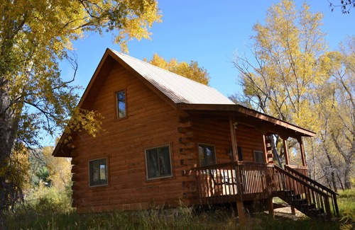 Pagosa Springs Cabin | River Home: secluded log cabin along San Juan River & MONTH-to-MONTH possible!