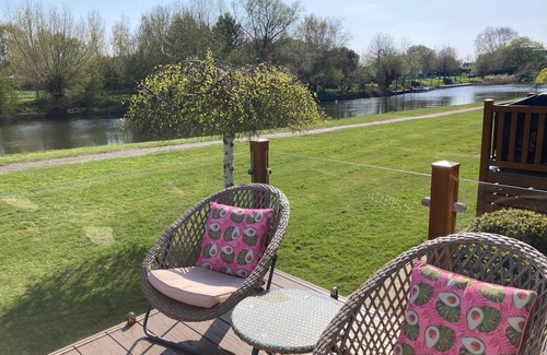 Tiddington House | River Retreat Lodge is front line with panoramic views over the river Avon.