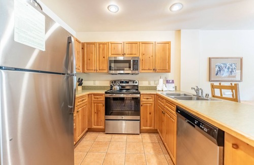 River Run Condo | River Run Condo with Spacial Balcony overlooking Ice Rink & Mountain Views!