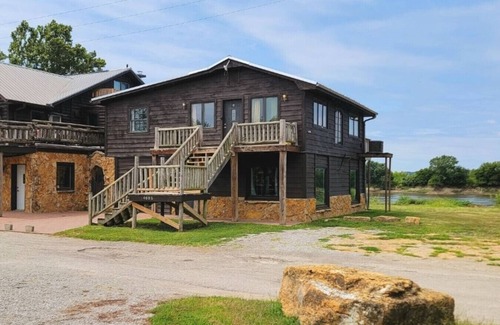 St. Joseph Cabin | Riverfront 2 bdrm Jacuzzi Cabin w/Sunset Balcony