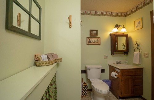 Boswell Cabin | Riverfront Cabin with Bluff Views Covered Deck and Hot Tub