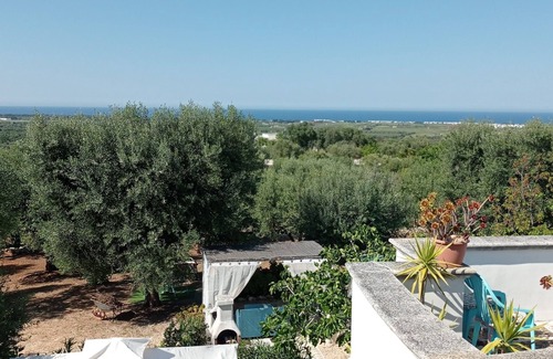 Carovigno Cottage | Romantic Trullo for 2/3 sea view pool Wifi, wonderful peaceful garden