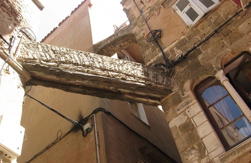 Aglientu Apartment | Room 'Tarzan Jane' with Shared Pool, Private Terrace and Air Conditioning