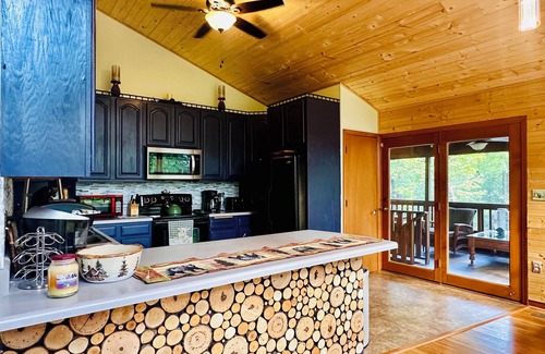Sevierville Cabin | Rustic Luxury in the Smokies: 3-Level Deck, Treehouse, Hot Tub and Games Galore