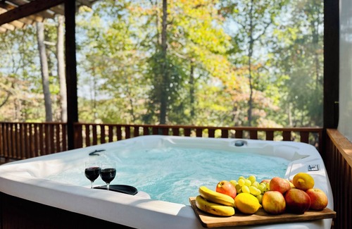 Sevierville Cabin | Rustic Luxury in the Smokies: 3-Level Deck, Treehouse, Hot Tub and Games Galore