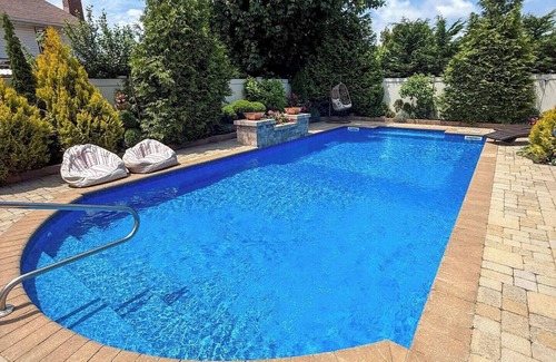 Massapequa House | Ryder Cup Accommodation < 10 miles from Bethpage Black, heated salt water pool