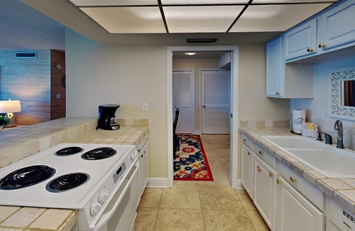 Villa Sabine Condo | Sabine Yacht & Racquet #2B | Bayfront, Pool Views!