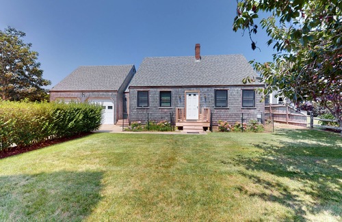 West of Town House | Sail Away Cottage | Dog-friendly house in Nantucket with indoor/outdoor living