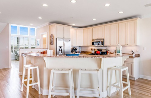 Fenwick Island House | Salt Meadows townhouse w/elevator, gas grill & community pool and pier