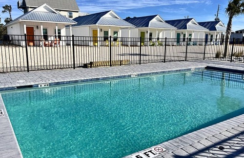Port St. Joe Cottage | "Scallop Cottage" is a pet friendly, 2 bed, 1 1/2 bath unit accepting 5 guests. Pool Coming 2025!