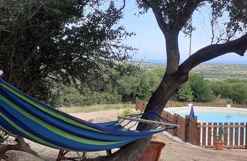Aglientu Apartment | Sea breeze apartment with swimming pool and sea view, air conditioning,