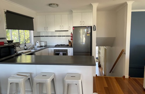 Rhyll House | Seadale: a lovely modern 3 level home with amazing views from the Alfresco.
