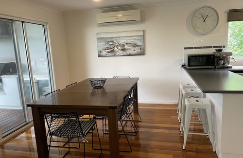 Rhyll House | Seadale: a lovely modern 3 level home with amazing views from the Alfresco.
