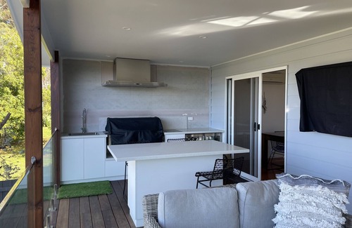 Rhyll House | Seadale: a lovely modern 3 level home with amazing views from the Alfresco.