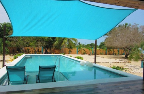 Sarteneja House | Seafront Tropical Caribbean luxurious home w/pool at Iguana Beach House Belize